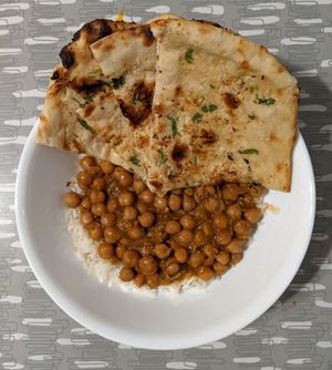 chana masala, rice, garlic naan at Maruti Indian Restaurant  in Portland
