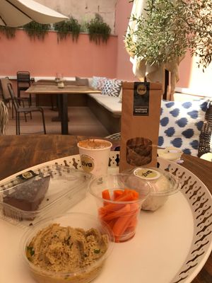 Raw Chocolate cake, carrots, hummus, vegan cheese made of fermented almonds, raw crackers, cappucino with almond milk :) lovely place at Ziva To Go - Oasis in Mallorca