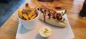 Tasty but the sausage don't really fit in the bun. at Dogma in Utrecht