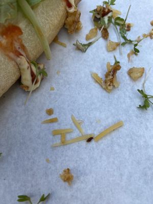 Grated cow cheese on vegan hotdog. Staff apologized.  at Dogma in Utrecht