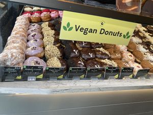 Raspberry Jam, blueberry crumble , Ferrero rocher, cookies and cream, the dub ( custard and our favourite) , peanut butter , lotus biscoff , and one more I can’t see/ remember.!  at The Rolling Donut - Bachelors Walk in Dublin