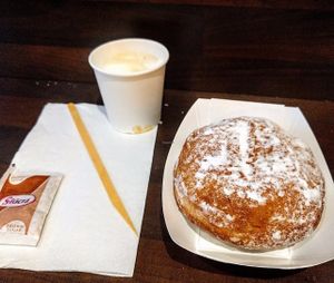 Raspberry filled Doughnut. Macchiato with Soy Milk Foam. at The Rolling Donut - Bachelors Walk in Dublin
