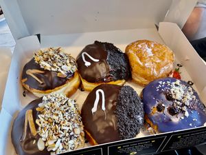 From left: peanut butter cup, cookies and cream, strawberry eton mess and blueberry crumble   at The Rolling Donut - Bachelors Walk in Dublin