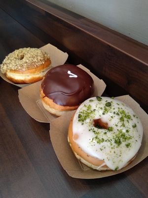vegan dub in the middle:) on the right , pistacchio vanilla and on the left walnut coffee :) at The Rolling Donut - Bachelors Walk in Dublin