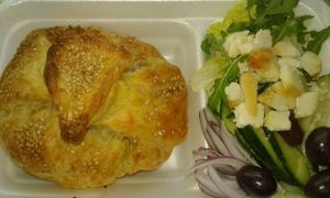 A Medley of Stir-Fried Vegetables baked in Flaky Pastry served with Salad Greens Topped with Almond Feta & Olives  at Vegan To Order in Windhoek