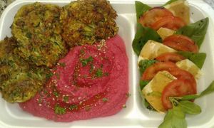 Beet Hummus with Zucchini Fritters & Tomato/Fresh Basil/Vegan Cheese Salad Drizzled with Balsamic Vinegar & Olive Oil.  at Vegan To Order in Windhoek