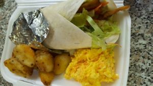 Chilli 'Vegan Chik'n' Wraps (Wraps filled with Vegan Chik'n, Crisp Fresh Greens n Veges & Sauce) served with Crispy Oven Fried Potatoes. Your choice of hot or mild. at Vegan To Order in Windhoek