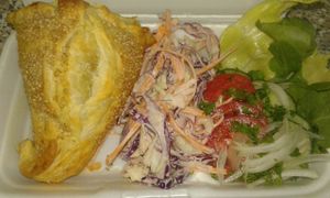 Potato Borekas, (a Middle Eastern Style Flakey Pastry with a Savoury Potato filling & garnished with Toasted Sesame Seeds served with a Tricolour Slaw & Green Salad. at Vegan To Order in Windhoek