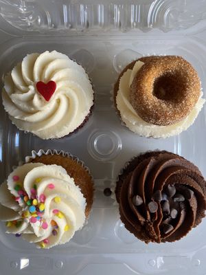 Red velvet, cinnamon donut, vanilla birthday cake, chocolate chip at Two Birds Baking Company in Fullerton