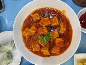 Tofu in tomato sauce.   at Vegan Family Restaurant in Ho Chi Minh City