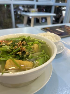 Soup with little bowl of extra rice  at Vegan Family Restaurant in Ho Chi Minh City