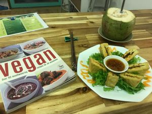 Crispy tofu and fresh coconut at Vegan Family Restaurant in Ho Chi Minh City