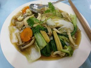 Fried noodles with vegetables and mushrooms at Vegan Family Restaurant in Ho Chi Minh City