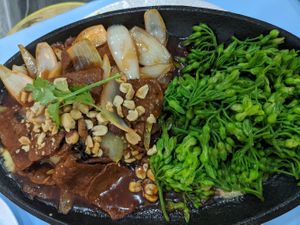 Vegan beef - so delicious, definitely try this. It comes with rice noodles on the side. at Vegan Family Restaurant in Ho Chi Minh City