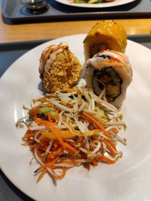 Vegan sushi and salad from the buffet at Veganio in Prague