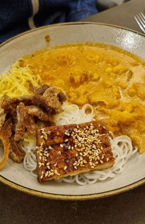 Curry with fried mushrooms, noodles & tofu at Nordvegan in Oslo