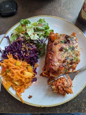 Lasagne with generous side salad at Nordvegan in Oslo