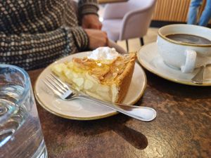 Warm apple pie with whipping cream at Nordvegan in Oslo