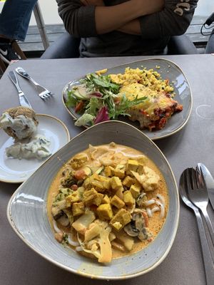 lasagna and curry bowl at Nordvegan in Oslo