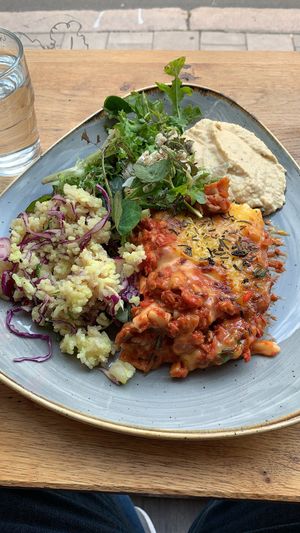 Lasagne with salad and hummus  at Nordvegan in Oslo