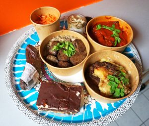 Delivery: Medaillon de steak + gratin dauphinois + lasagna + pickles + opéra + boudin noir at Le Faitout Vegan in Paris