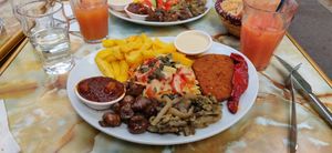 "escalope panée" with ginger, orange, and watermelon juice. at Le Faitout Vegan in Paris