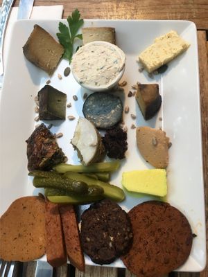 Mixed plate with cheeses and vegan meets  at Le Faitout Vegan in Paris
