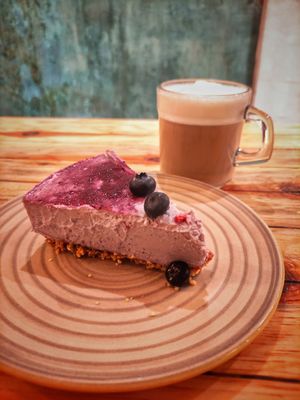 Raw cheesecake with cappuccino at Aura Vegana in Mexico City