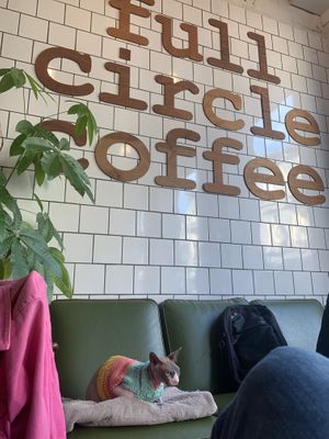 She loves it here and I love the coffee.  at Full Circle - Zuid in Ghent