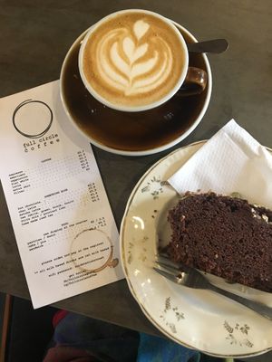 Flat white and a banana bread  at Full Circle - Zuid in Ghent