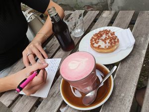 Pink latte, cola and a donut at Full Circle - Zuid in Ghent
