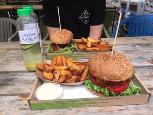 Crumbed Burger with Fries & Garlic Sauce- Carrot Burger in background  at Las Vegan's - Kazinczy Trailer in Budapest