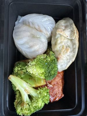 Mushrooms dumplings, veggie dumplings, and general tso left overs.  at Ginger Root in New York City