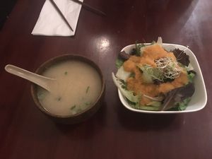 Salad and soup served with main dish at Ginger Root in New York City