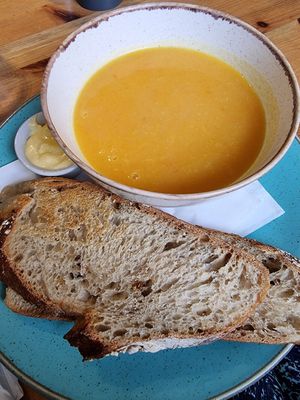 Delicious soup of the day with warm bread at Holy Cow in Edinburgh