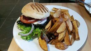 Vegan 'fish' burger with wedges at Holy Cow in Edinburgh