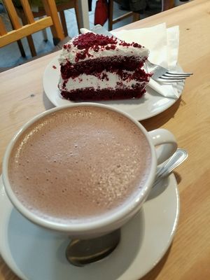 Vegan red velvet cake and hot chocolate! at Holy Cow in Edinburgh