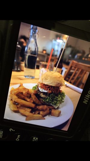 Burger and fries  at Holy Cow in Edinburgh