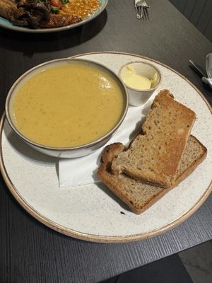 Parsnip, leek, and potato soup with gluten free buckwheat bread  at Holy Cow in Edinburgh
