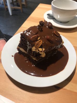 Peanut butter and chocolate cake with chocolate sauce at Holy Cow in Edinburgh
