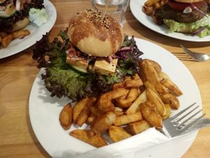 Tofu burgers and amazing chips. Delicious homemade bread... amazing selection of vegan cakes too! at Holy Cow in Edinburgh