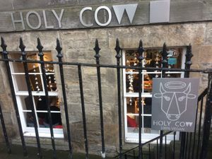 Look for this at street level, then take the stairs down at Holy Cow in Edinburgh