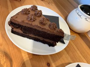 Chocolate cake - not great though - icing is waxy at Holy Cow in Edinburgh