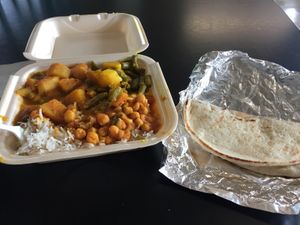 Three Vegetables (Potatoes + green beens, chana masala, and aloo mutter) with rice and vegan naan  at Flavors of India in Columbus