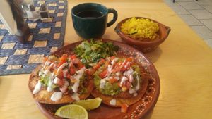 Guacamole Tostadas with a coffee at Tumerico in Tucson