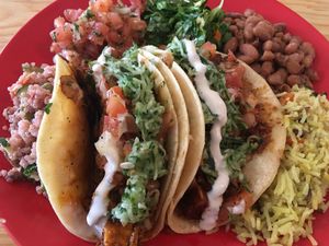 One mole taco, one chile negro taco at Tumerico in Tucson