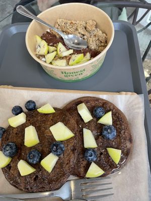 Yoghurt bowl and pancakes  at La Vegana in Sevilla