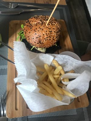 Veggie burger (not even 1 chips taken yet) at La Biciclette in Panama City
