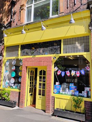 Though a lovely bright yellow now, it's a shame they've painted over the name! at Surbiton Natural Health Centre in Surbiton
