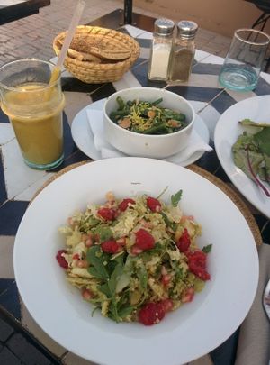 Avocado, orange and date smoothie. Coliflower salad with fruit and green beans at NOMAD in Marrakech